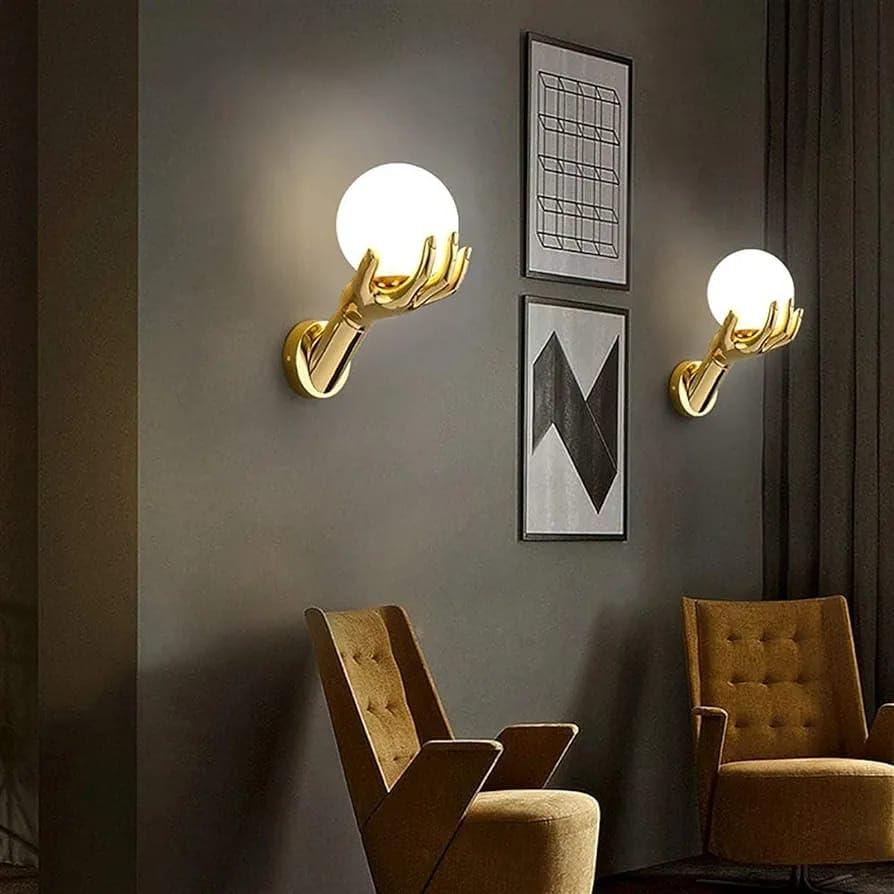 Creative Gold Hand Wall Sconce with Glass Globe